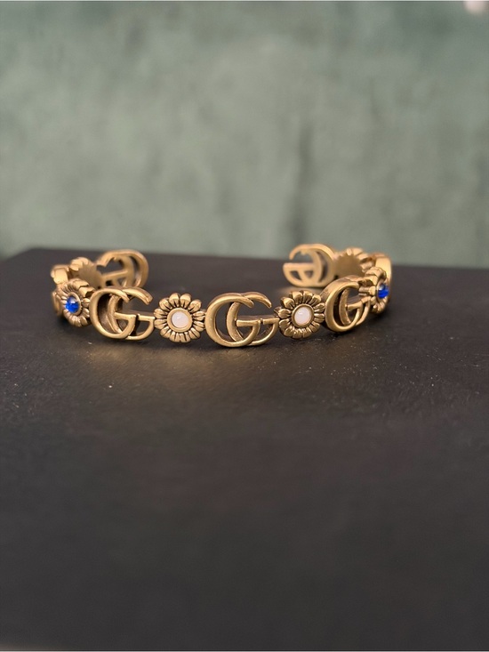 Gucci Jewelry - Gucci Double G Floral Open Cuff Bracelet Gold Tone Daisy Motif